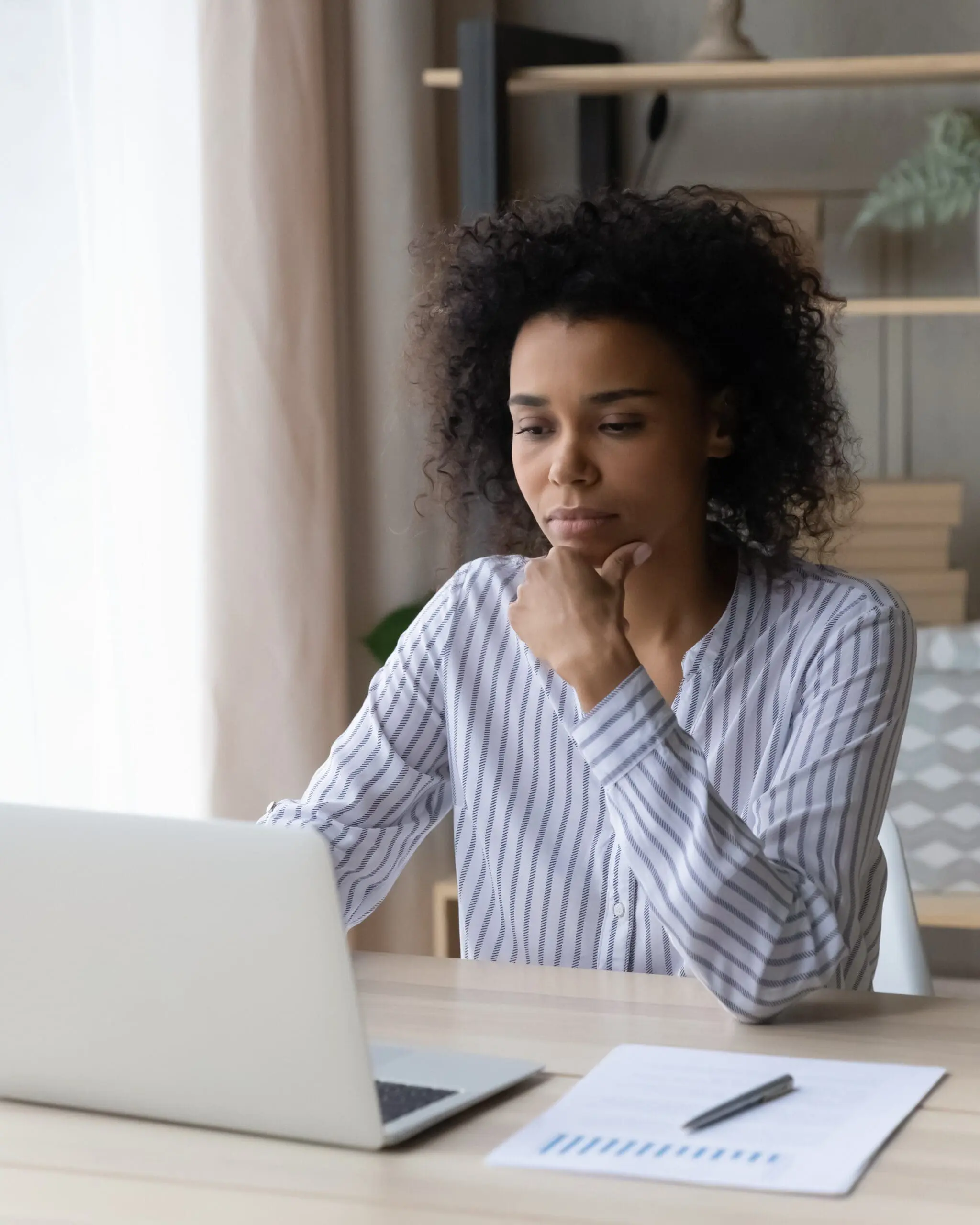 Pensive African American Woman Work On Laptop Online