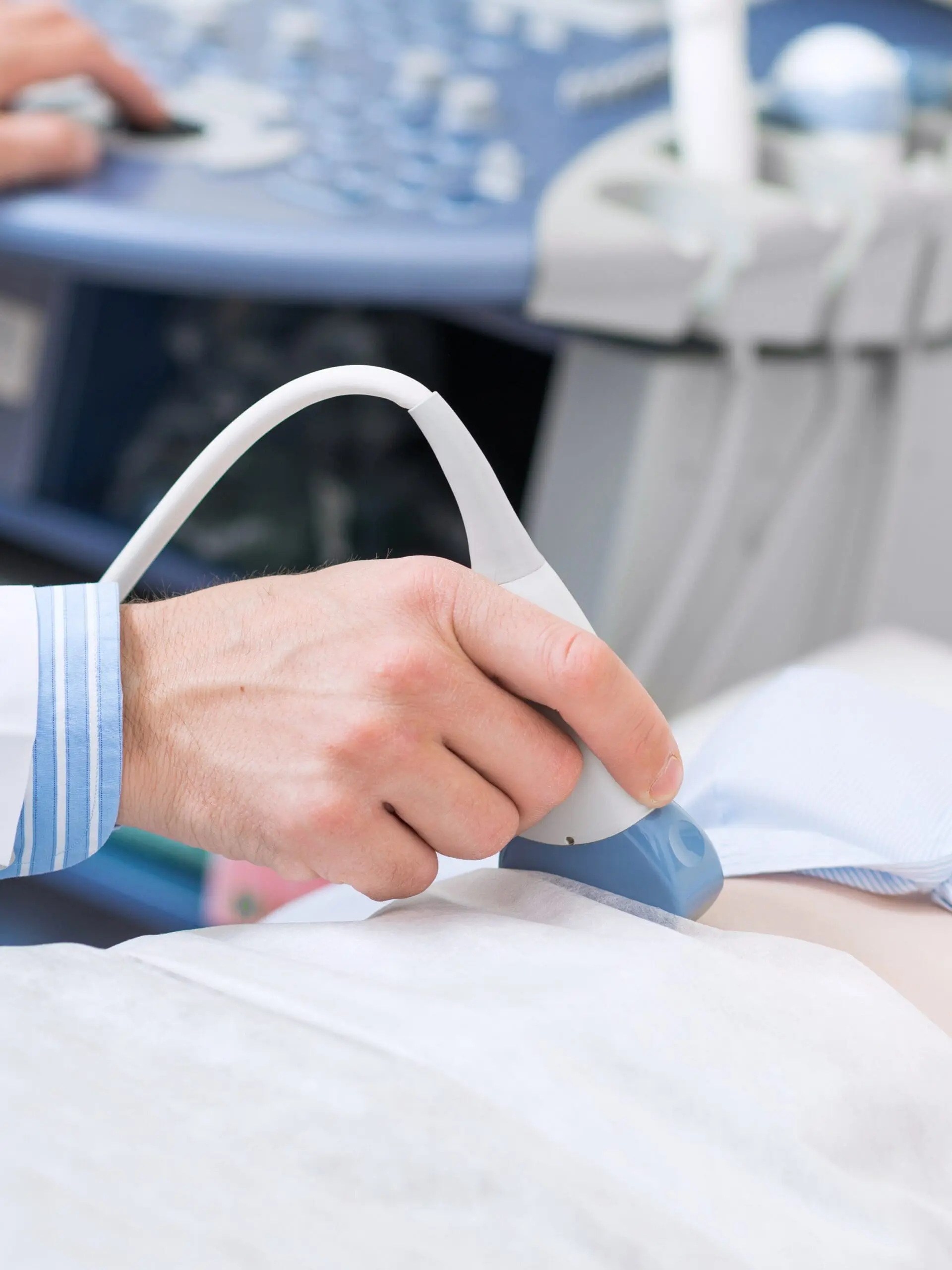 bigstock-Sonographer-Using-Ultrasound-M-325264069