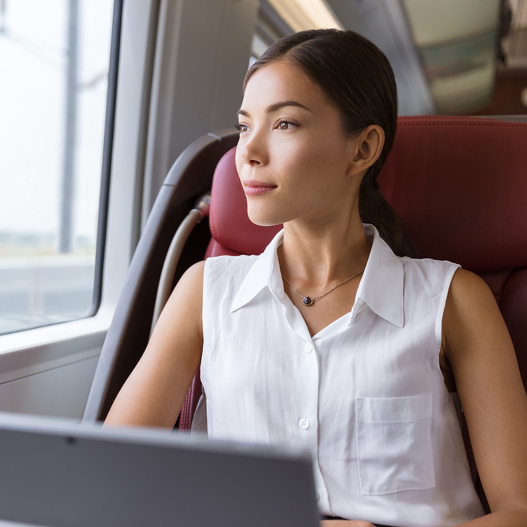 bigstock-Asian-woman-traveling-using-la-175495684