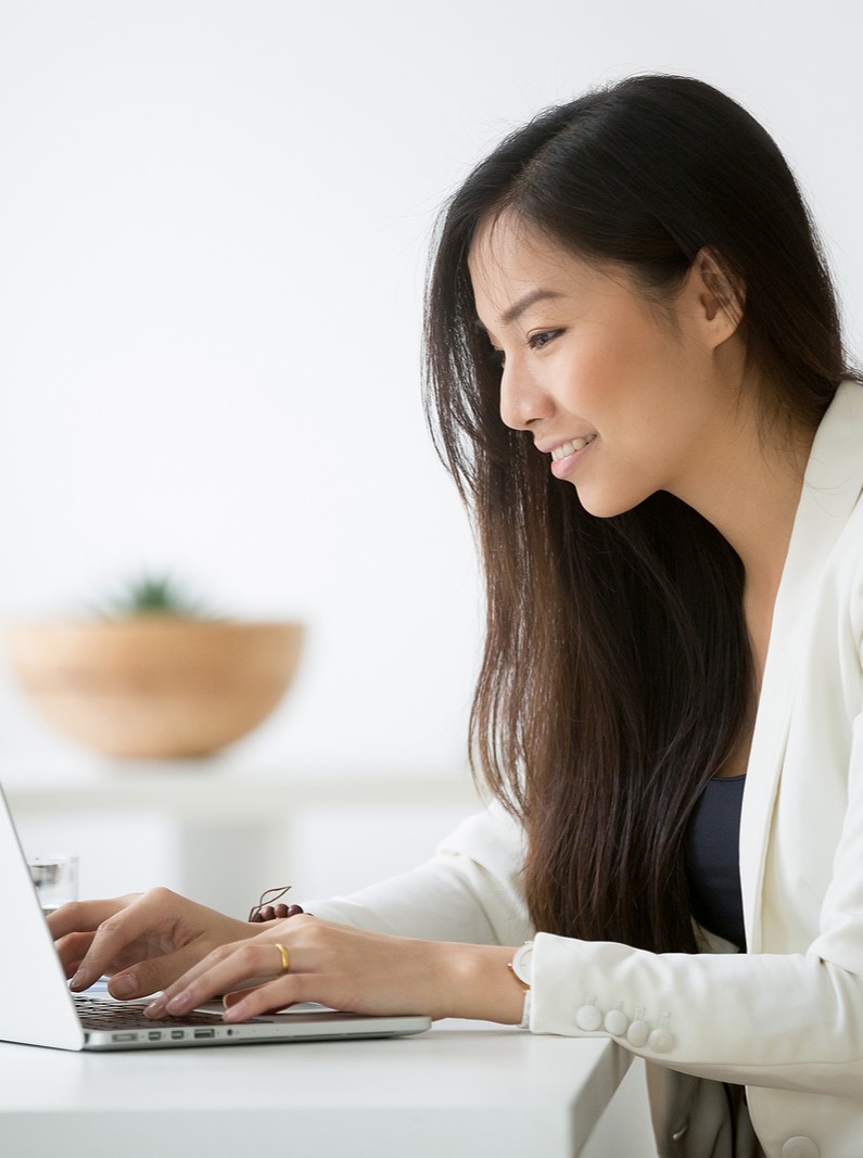 bigstock-Smiling-Young-Asian-Businesswo-240331666