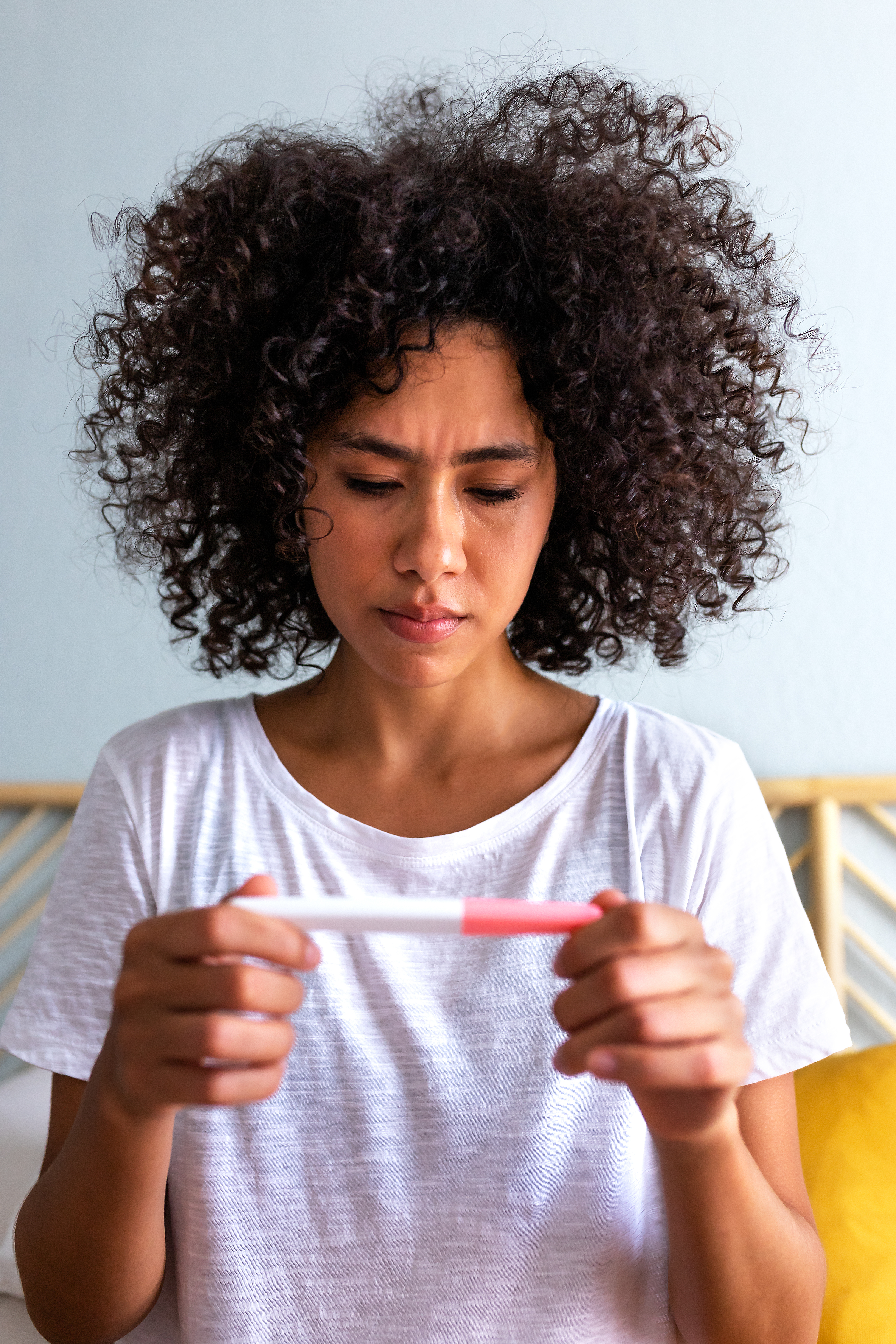 Woman Sad To See Negative Pregnancy Test. Young African American